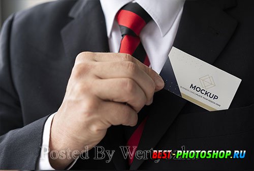Close-up businessman putting business card mock-up in his pocket