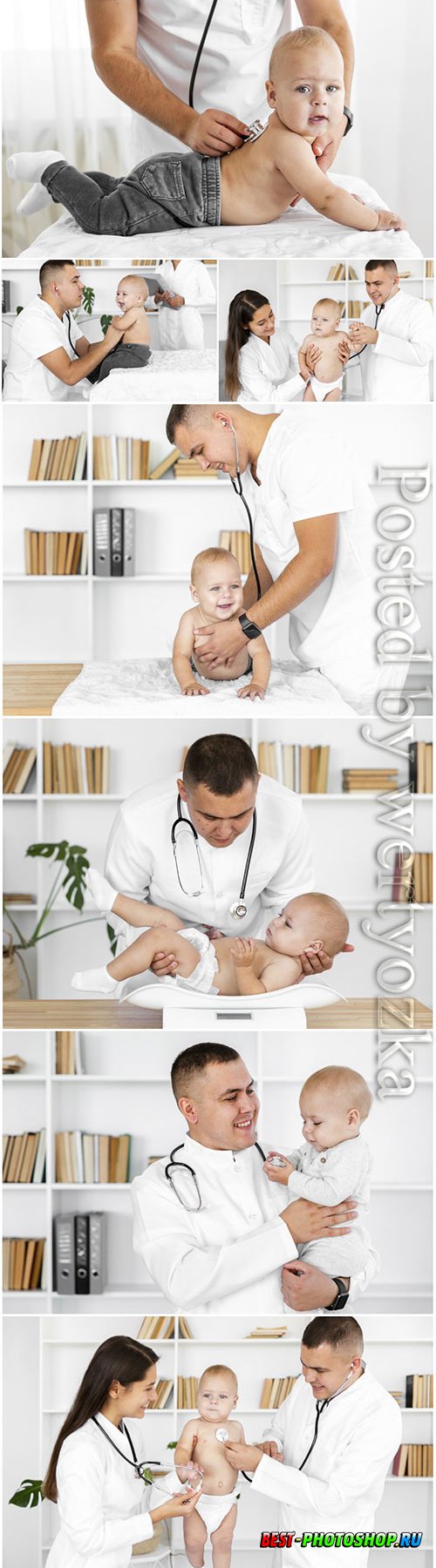 Doctor hands listening little baby stock photo