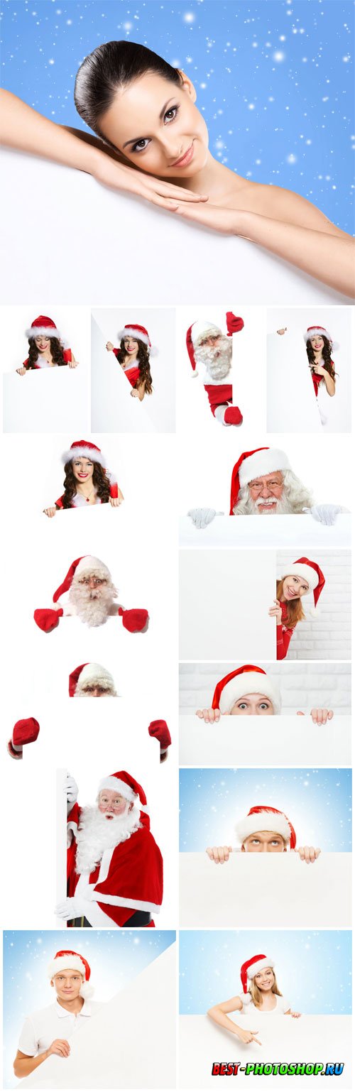 People in santa costumes holding posters stock photo